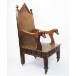 A late 19th century oak hall chair, with parquetry back and solid seat,