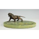 An Art Deco bronze tiger desk stand,