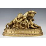 A French gilt painted cast composite cherub and fawn group,