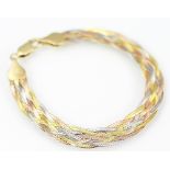 A tri-colour gold bracelet, designed as multiple woven strands in rose, white and yellow gold,