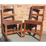 A set of four 19th century oak provincial country chairs, with solid seats,