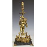 A large French gilt metal cherub lamp base,