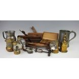 A selection of vintage items to include; a Premier brass carbide lamp, two other carbide lamps,