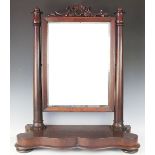 A large William IV carved mahogany dressing table mirror,
