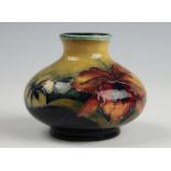 A Moorcroft Orchid pattern vase,