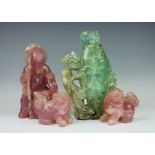 Three Chinese quartz figures comprising of three pink quartz examples,