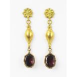A pair of garnet set drop earrings, with post and butterfly fittings, gross weight 3.