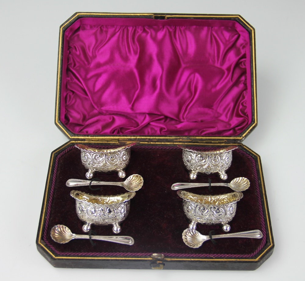 A Victorian cased set of four silver plated salts and spoons, James Dixon & Sons,