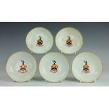 Five Lowestoft armorial porcelain saucers, circa 1790,