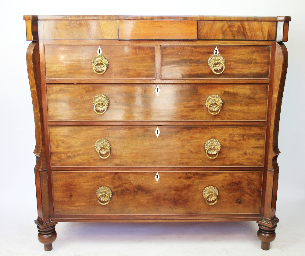 A William IV mahogany chest, with frieze drawer above two short and three long drawers,