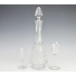 A selection of glass comprising of a cut glass decanter and stopper, 38cm high,