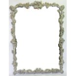 A modern carved wood and composition painted mirror, modelled throughout with acorns and oak leaves,