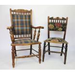 An Edwardian beech kitchen chair, with upholstered back and seat on turned legs,