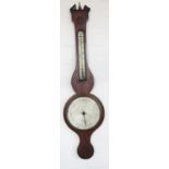 An early 19th century inlaid mahogany wheel barometer,