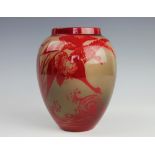 A Bernard Moore Art Pottery flambe vase, decorated with four geese, waves and rushes,