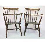 A pair of rustic Windsor type chairs, 20th century, painted beech with solid seats, on turned legs,
