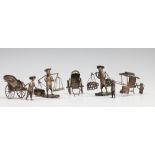 A selection of Chinese silver figural miniatures to include a sedan chair,