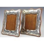 A pair of Edwardian Art Nouveau silver photograph frames, Sheffield 1911,