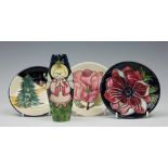 A selection of Moorcroft pottery, to include; a vase decorated with a Christmas angel circa 2008,