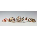 Five Royal Crown Derby paperweights comprising; three Collectors Guild Exclusive examples,