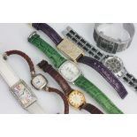 A collection of assorted ladies wristwatches,