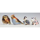 Four Royal Crown Derby paperweights comprising; sitting duckling, waxwing,