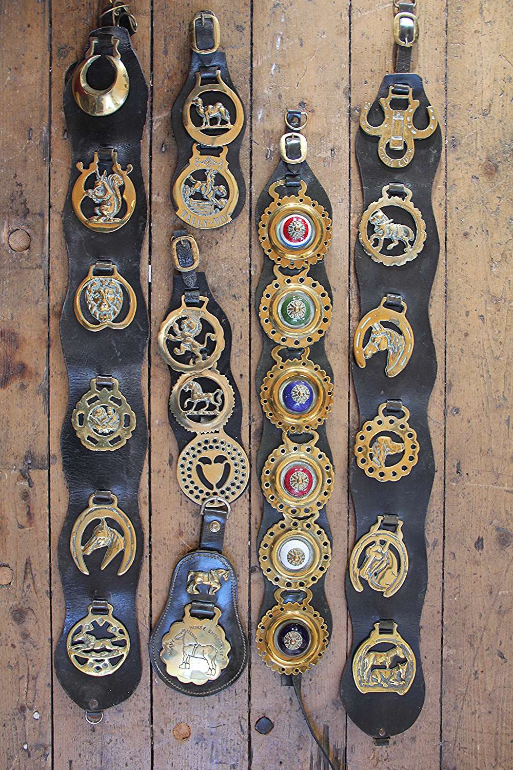 A collection of brass and ceramic and brass horse brasses, some with leather backings, - Image 2 of 4