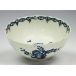 A Caughley bowl, circa 1775, printed in underglaze blue with the fruit and wreath pattern,