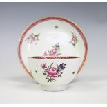 A Caughley teabowl and saucer circa 1780,