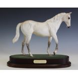 A Royal Doulton model of Desert Orchid, on oval base,