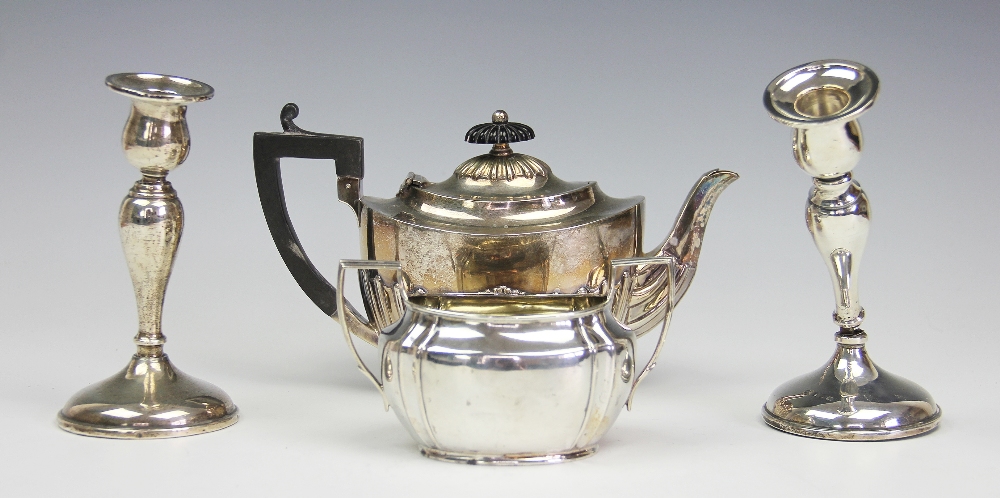 A silver batchelors teapot, Arthur Cook, Birmingham 1903, of oval half reeded form,