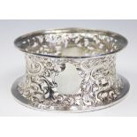 A Victorian silver dish or potato ring, Daniel and John Wellsby, London 1900,