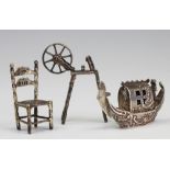 Three continental silver import miniatures comprising; a chair, London 1895, 4.