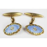 A pair of diamond set and enamelled cufflinks,