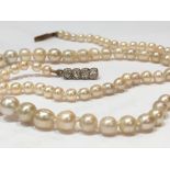 A single strand graduated natural pearl necklace, the eighty nine pearls graduating from 3.