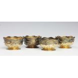 A set of four Victorian silver gilt salts Sibray Hall and Co, Sheffield 1882,