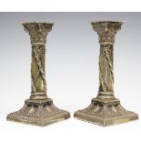A pair of Vicotrian silver candlesticks, of Adam design, Thomas Bradbury & Sons, London 1897,