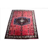 A Persian Shiraz woll rug,