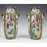 A pair of late 19th century Chinese canton vases,