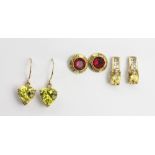 Two pairs of yellow/green stone set earrings,