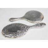 An Art Nouveau silver hand mirror, Birmingham 1901, decorated with poppies and initialled AMH, 31cm,