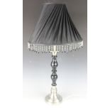 A pair of modern white metal and black painted table lamps, with pleated shades, 90cm.
