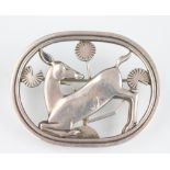 A Georg Jensen 'Kneeling fawn' brooch numbered 256, import marks London 1950,