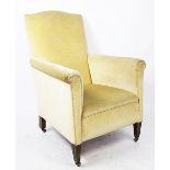 An Edwardian salon tub chair, with yellow upholstery,