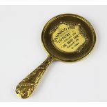 A brass mounted advertising miniature hand mirror,
