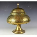 A 19th century Persian brass vessel and cover,