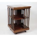 An Edwardian mahogany revolving bookcase,