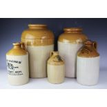A collection of five 19th century and later salt glazed jars and flagon's,