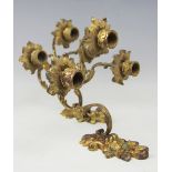 A pair of 19th century gilt metal three branch wall lights, of 18th century design,