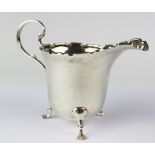 A silver cream jug, Adie Bros Ltd, Birmingham 1932,